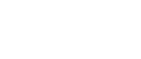 Personal de seguridad privada de Fortox con uniforme, patrullas y edificio empresarial al fondo, realizando labores de vigilancia. - Fortox