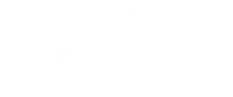 Personal de Fortox en uniforme de seguridad privada frente a edificios empresariales y vehículos de vigilancia en Colombia. - Fortox
